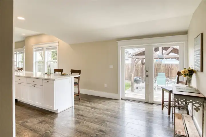French doors lead out to the patio and gazebo