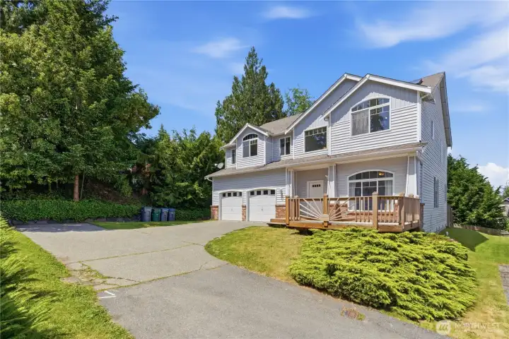 Welcome to this charming home nestled at the end of a quiet street, offering a semi-private setting enhanced by mature trees. The thoughtfully positioned lot feels more spacious than it actually is, thanks to generous natural greenery and well-spaced neighboring homes, creating a peaceful and open atmosphere."