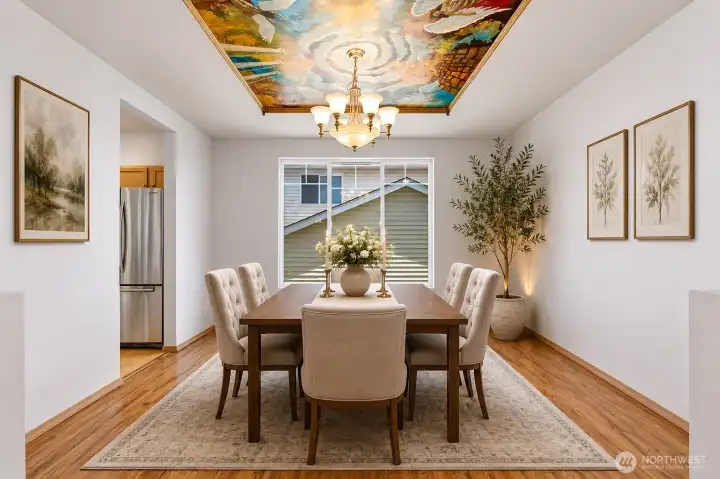 Virtually staged you can see how this dinning room comes to life. Easily spacious enough for a large group gathering with wall space for additional furniture.