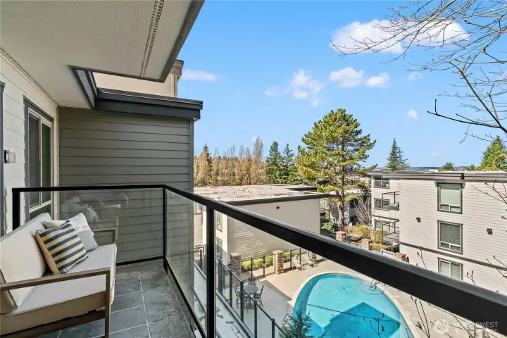 Enjoy morning coffee with pool and lake views