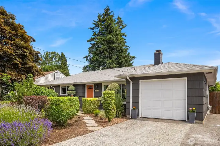 Gorgeous front yard oasis greets upon arrival.