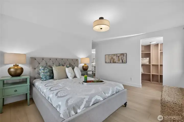 Walk-in closet in the background.