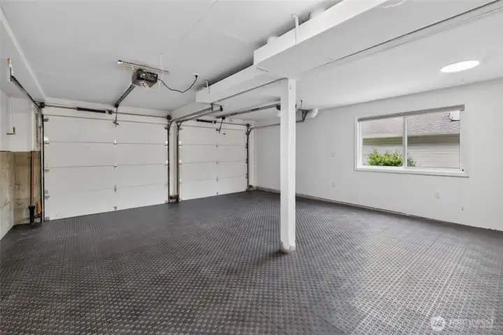 This garage is amazing, and offers tons of bonus storage and a coat closet right where you need it.