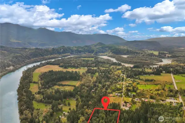 Depicting the proximity of the Skagit river winding around the property..