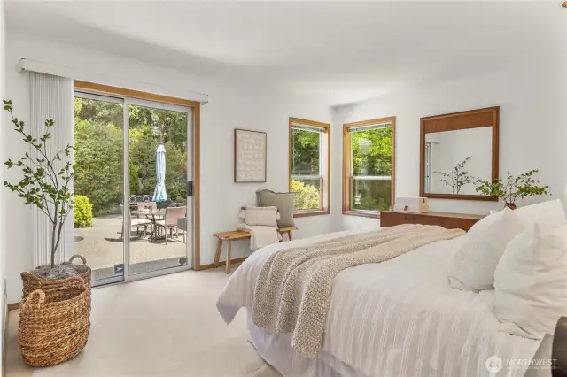 Light & bright primary suite with patio walk-out