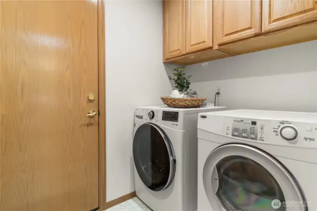 Laundry room with ample storage space!