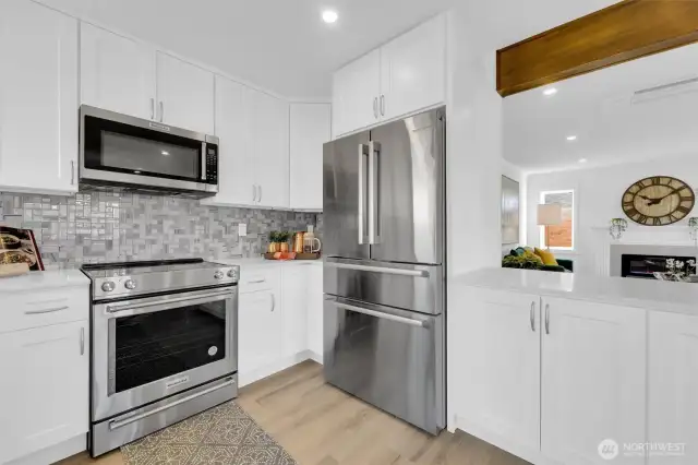 Gorgeous kitchen with KitchenAid & Bosch appliance package - 8042 19th Ave NW, Seattle, WA 98117