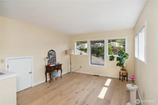 A space for multiple uses. Storage closet door has vast storage
