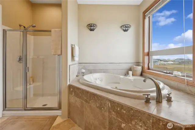 Soak in tub while enjoying ocean sunsets.