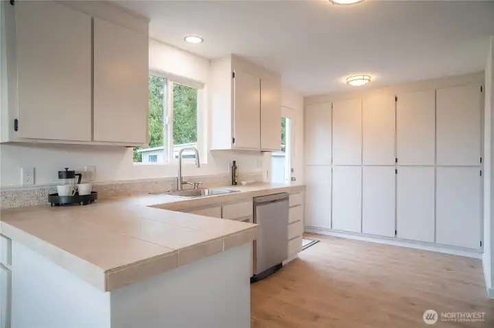 solid wood cabinets with full wall cabinet storage