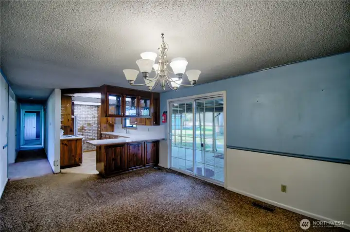 dining area off kitchen. Remove wall on left to open up to living room.