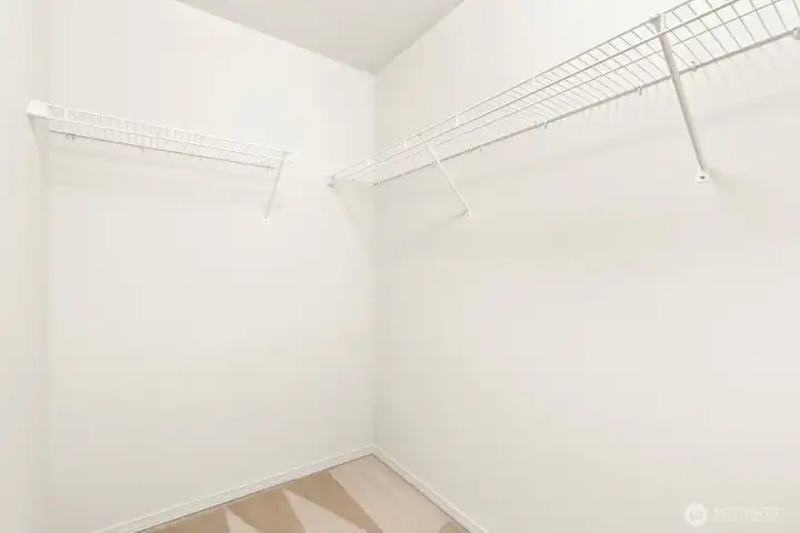 Walk-in closet in primary.