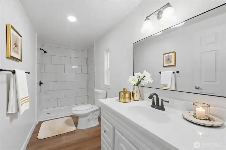 primary en suite with walk-in-closet and huge shower