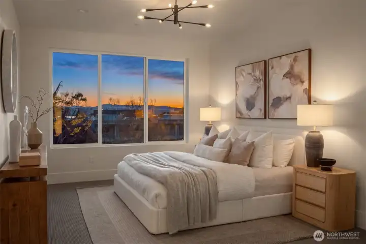Primary bedroom with incredible sunset views