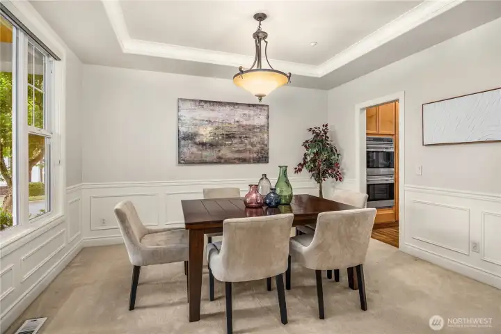 Formal dining room just to the left of entry, with easy access to the kitchen.