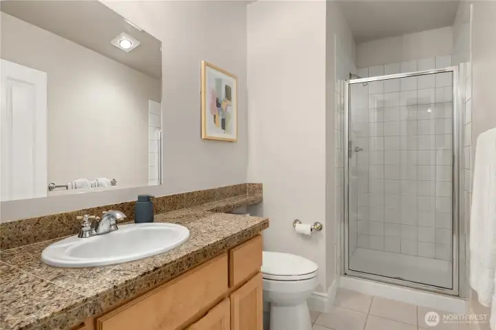 Main floor 3/4 bathroom, conveniently located down the hall from the living room.