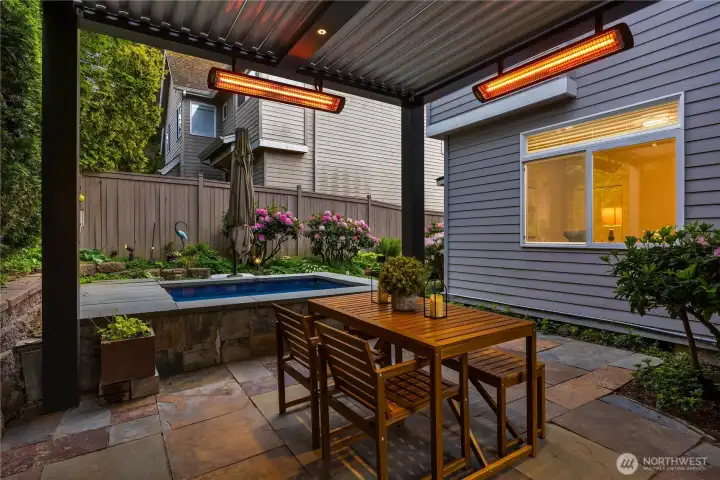 Create the perfect setting for relaxing or entertaining year-round in this perfect backyard retreat.