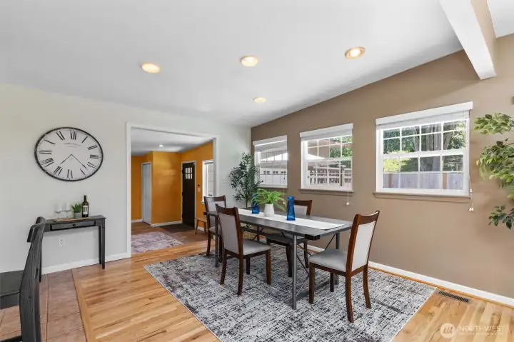 Dining leads to family room, and rear entry