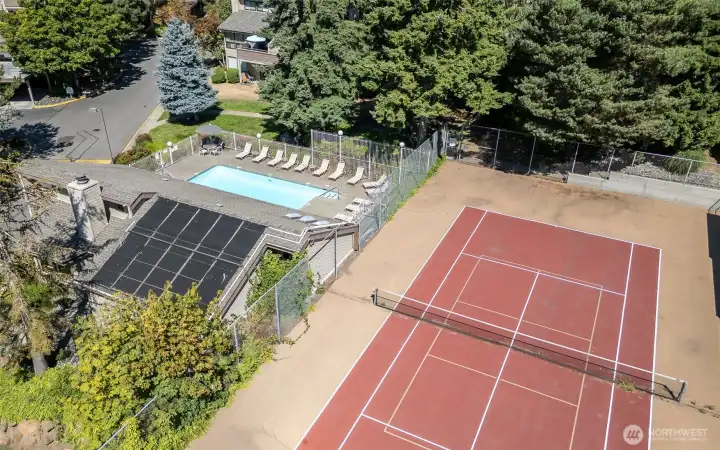 Tennis courts overlooking the pool Tennis courts overlooking the pool