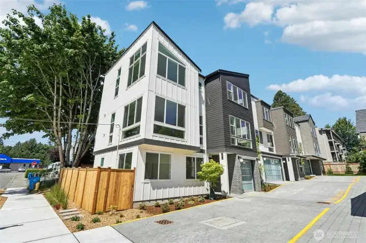 From left to right: 1516 NE 147th Street, 1512 NE 147th Street and 1508 NE 147th Street (furtherest off the street)