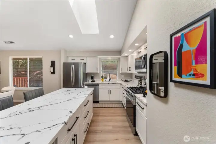 Stunning quartz countertops installed in 2025 and new, crisp white cabinetry create a clean, modern look. Stunning quartz countertops installed in 2025 and new, crisp white cabinetry create a clean, modern look.