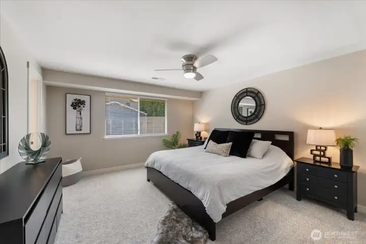 Spacious primary suite provides a peaceful place to unwind. Spacious primary suite provides a peaceful place to unwind.