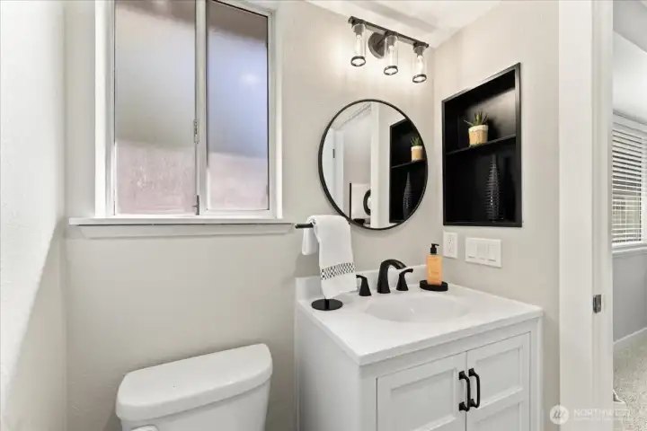 Contemporary vanity with updated fixtures adds a sophisticated touch. Contemporary vanity with updated fixtures adds a sophisticated touch.