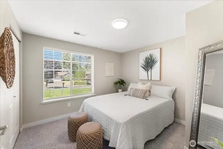 Bright secondary bedroom offers comfort and versatility. Bright secondary bedroom offers comfort and versatility.