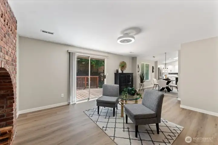 Sliding glass door provides easy access to the backyard deck. Sliding glass door provides easy access to the backyard deck.