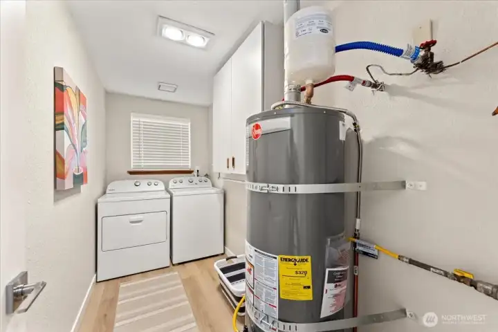 Dedicated laundry area adds everyday convenience. New Hot Water tank installed in 2025. Dedicated laundry area adds everyday convenience. New Hot Water tank installed in 2025.