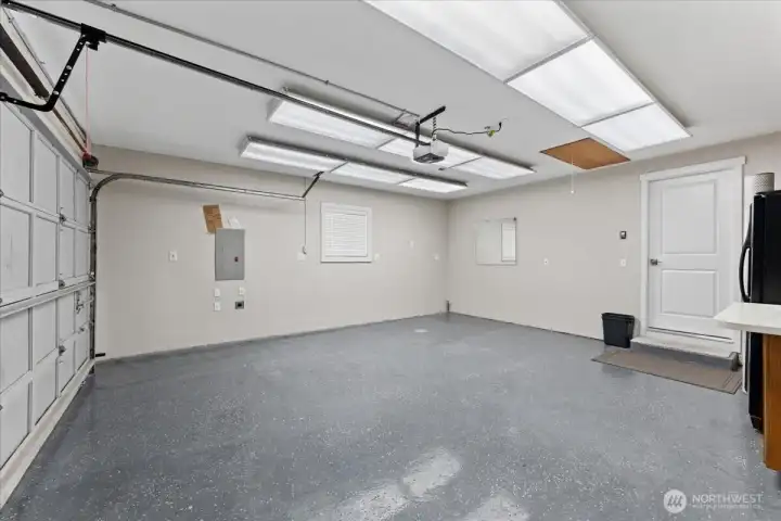 Garage has an Epoxy flooring and then a pull down for extra storage in the attic plus a new garage door opener in 2025. Garage has an Epoxy flooring and then a pull down for extra storage in the attic plus a new garage door opener in 2025.