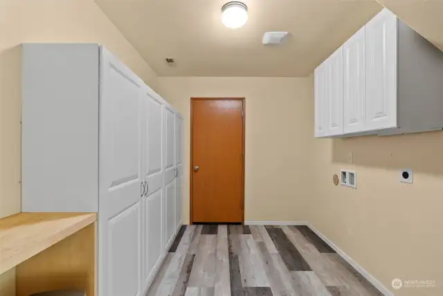 Mud room and laundry off the garage with built-in storage