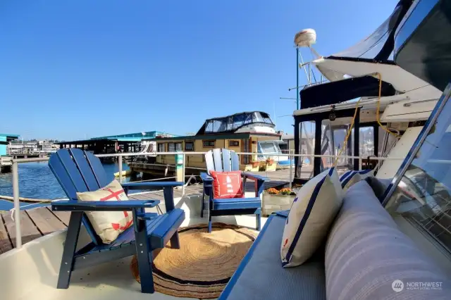 Large deck on the bow features oversized built-in benches with storage