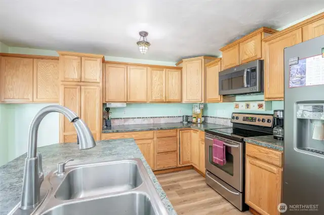 Plenty Of Cabinet Space And Island With Sink/ Dishwasher