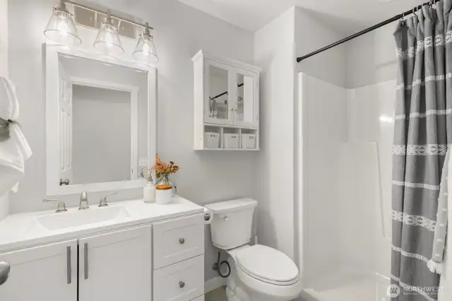 Main level 3/4 bath sits next door to office.