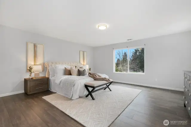 Over-sized primary suite sits on upper level.