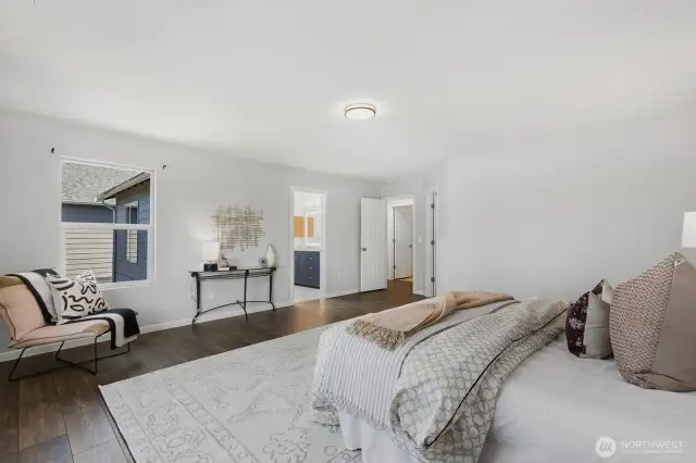 Primary suite, looking back to private en-suite.