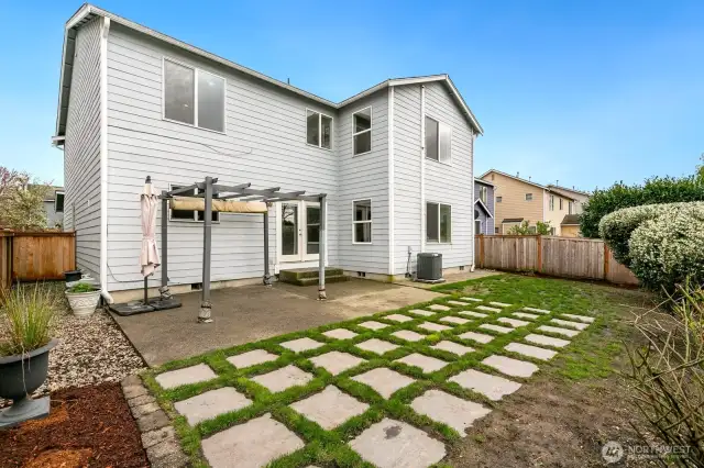Back yard and patio - yard is fully fenced with gate. AC too!