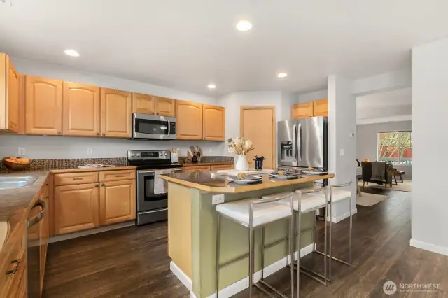 Kitchen sits just off dining area, making entertaining easy.