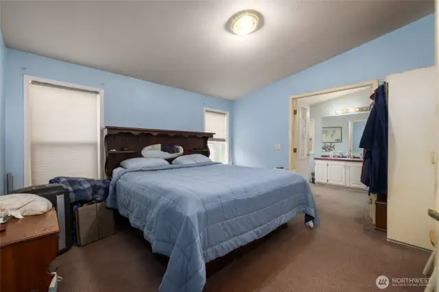 Primary bedroom with large primary bathroom attached.