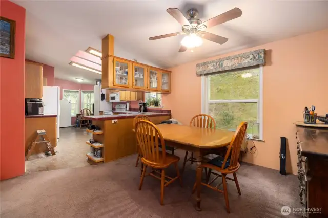Dining room with large window.