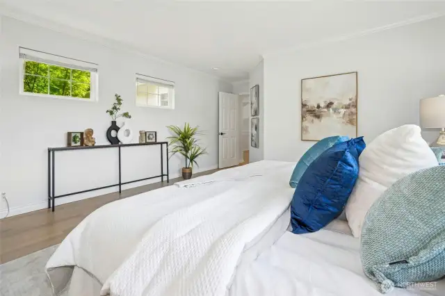 Cozy bedroom with ample natural light.
