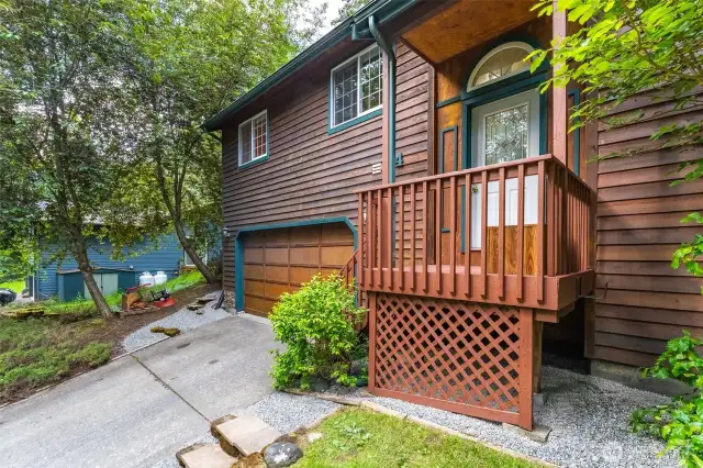 Driveay is medium grade into the garage, steps on front porch into the split level entry.