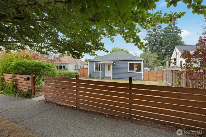 Fully fenced yard, with sidewalks ready to stroll