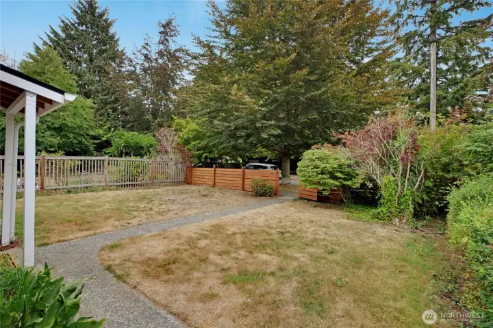 View from the side looking at the fully fenced front yard