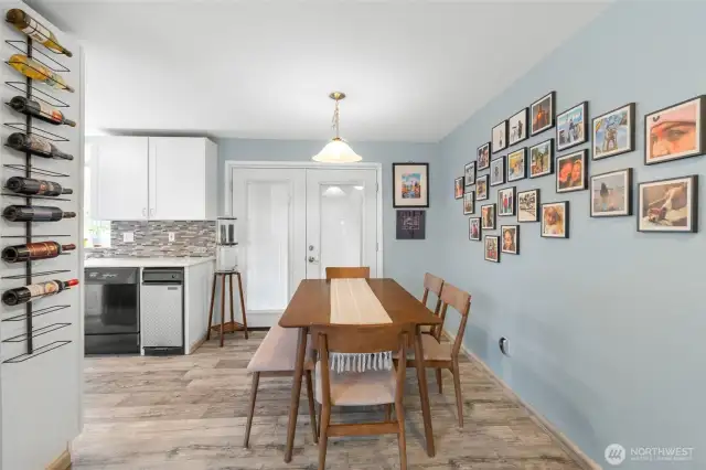 Beyond your dining area are the doors onto the covered deck.