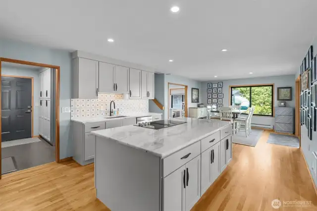 Stunning fully remodeled kitchen, 2nd dining room and massive pantry with a walk-in with custom shelving and a shower