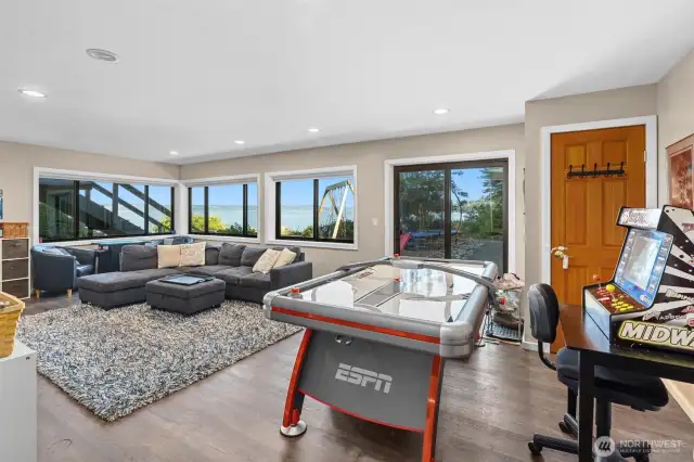 2-BEDROOM APARTMENT on Lower level living room. Could be an amazing MIL or addition al income potential. Featuring views of the Puget Sound and Mount Rainier, 2 ensuite bedrooms, kitchen and laundry room.