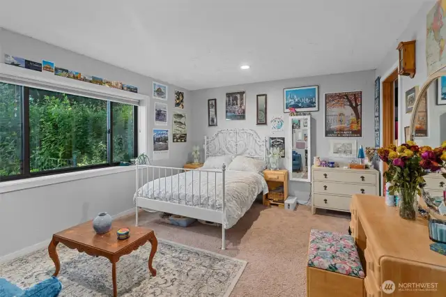 2 BEDROOM APARTMENT lower level Suite with a walk-in closet and private bathroom.