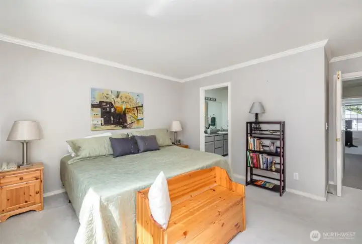 Primary bedroom boasts double door entry and private en-suite bathroom.